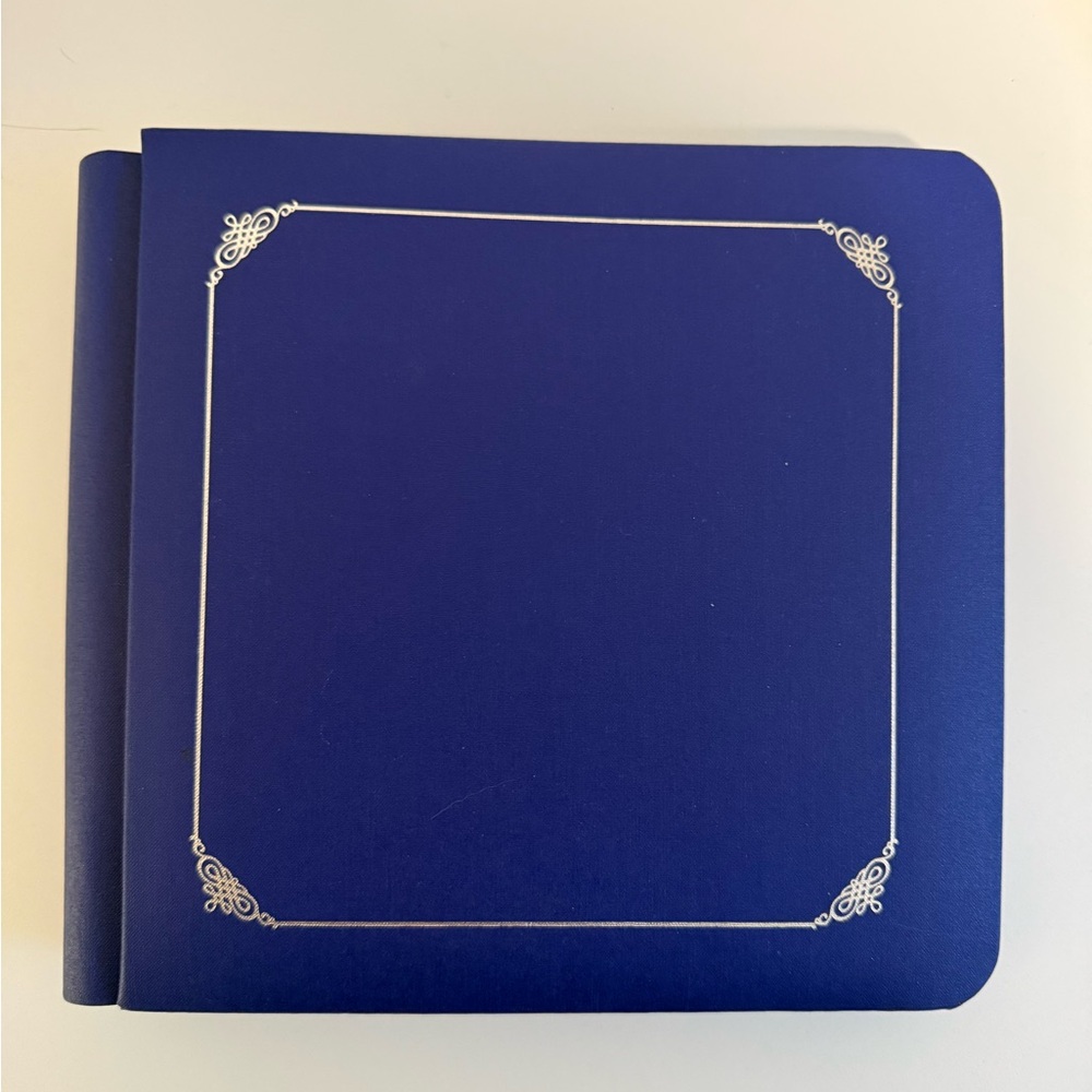 Creative Memories Royal Blue Photo Album with Silver Accents includes 12 pages